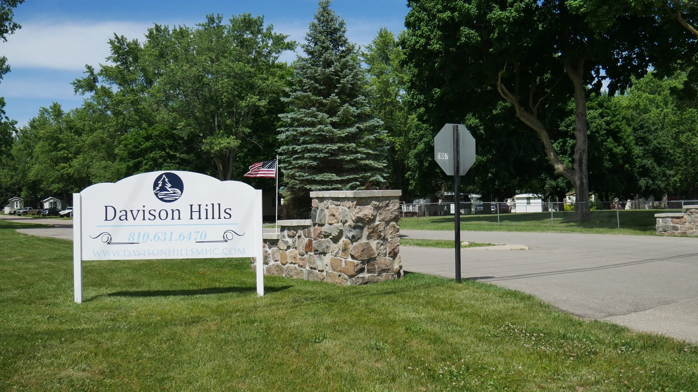 Davison Hills entrance sign and stone pillars