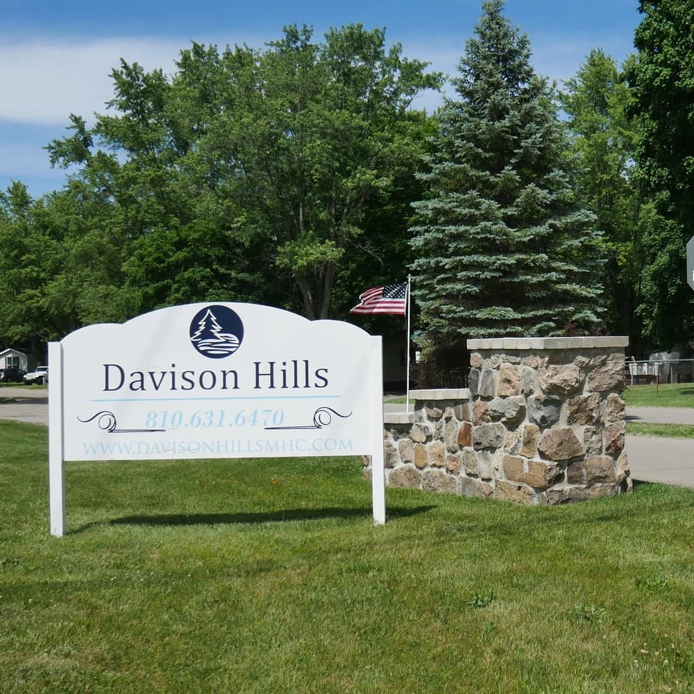 Davison Hills entrance sign and stone pillars