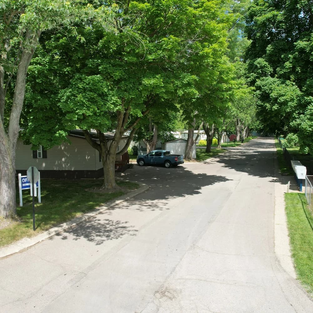 Tree-lined entrance lane beside the Davison Hills office